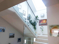 Treppe Innen aus Edelstahl und Glas